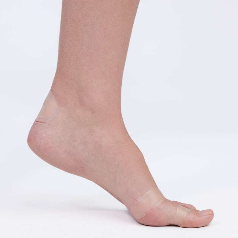 foot with plasters on it